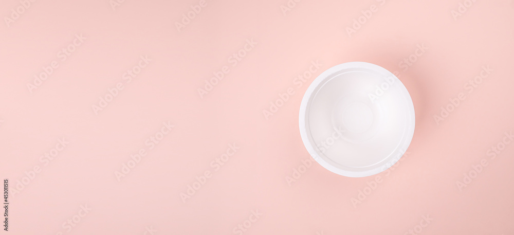 top view of Eco craft paper tableware. food containers on pink pastel background and copy space. recycle concept on photography image.