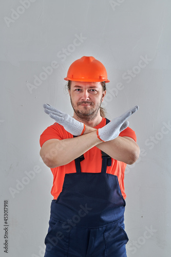 on a white background in bright overalls man