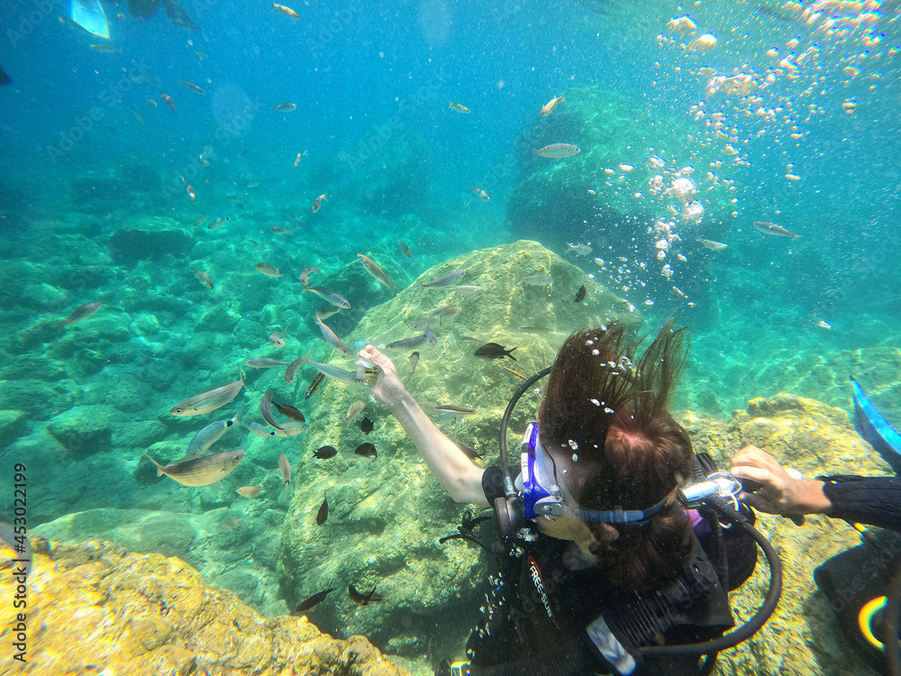Tourists scuba dive Mediterranian Sea. Marmaris,Turkey.