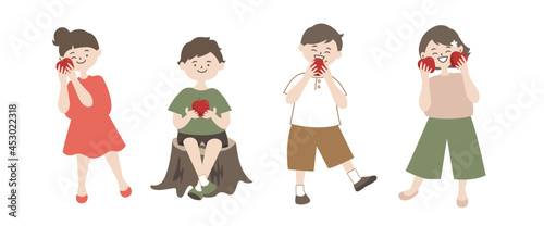 りんごを持って喜ぶ子供たち