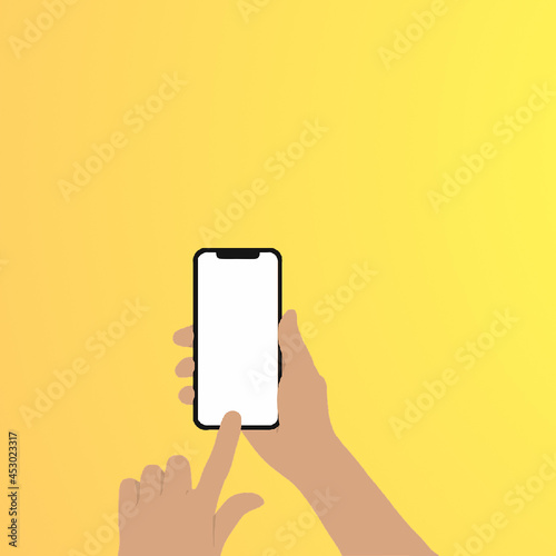 Hand holding smartphone with white screen. Isolated on a yellow background.