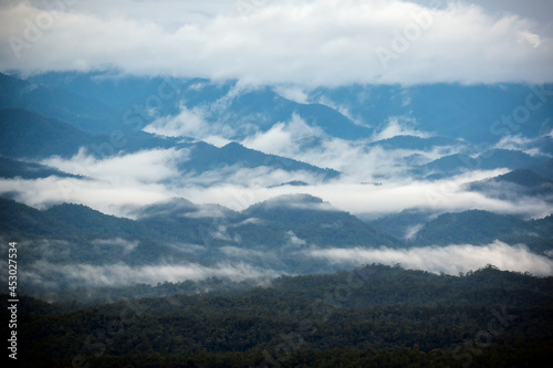 Scenic landscape with ocean clouds among the ridge during dusk or dawn at Mae Hong Son province Thailand.