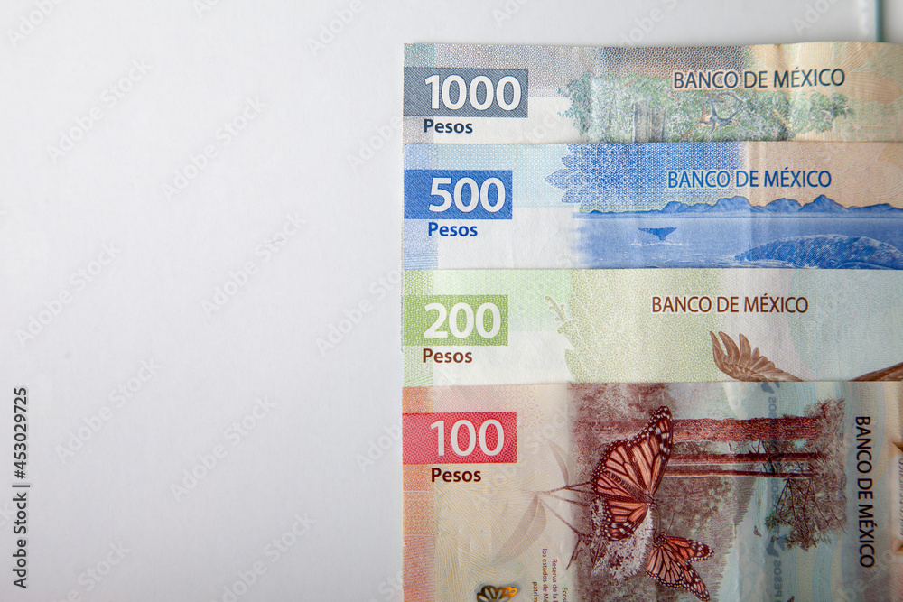 new bank notes of mexican peso background. 100, 200, 500, 1000 pesos - obrazy, fototapety, plakaty 