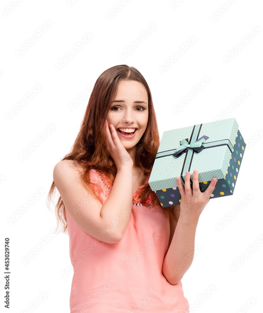 Young woman with giftbox isolated on white Young woman with giftbox isolated on white