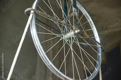 bicycle wheel on a wooden background