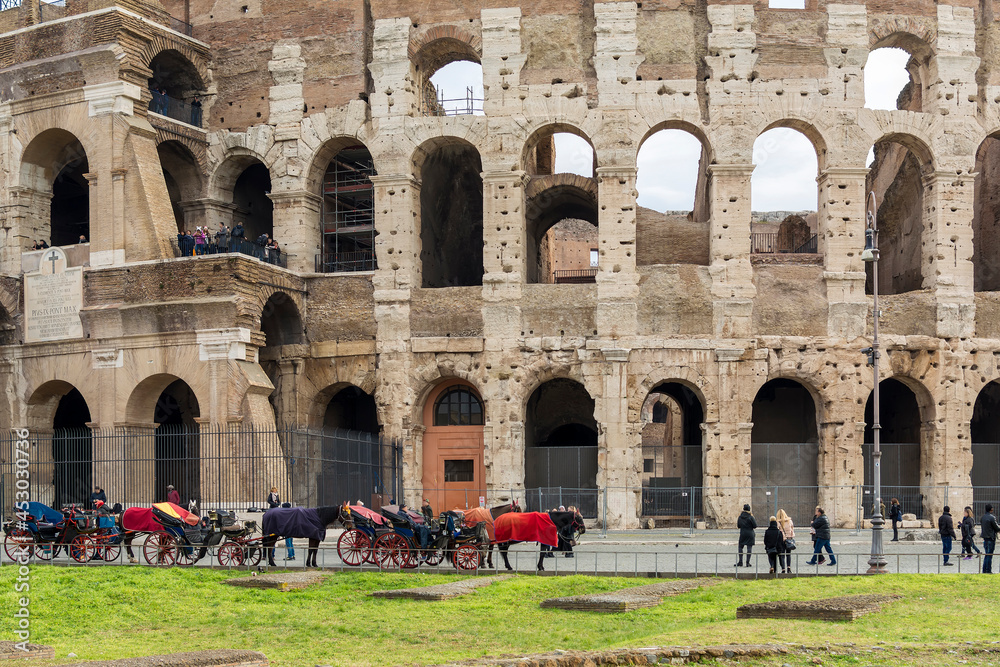 Colosseum, also known as the Flavian Amphitheater,  commissioned in A.D. 70-72 by Emperor Vespasian, is the largest amphitheater ever built, made of concrete and sand. Rome, Italy