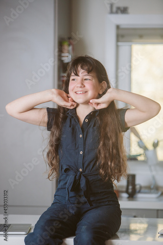 portrait of cute caucasian girl at home