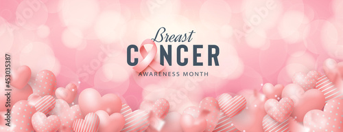 Breast cancer awareness with love balloons on bokeh background 