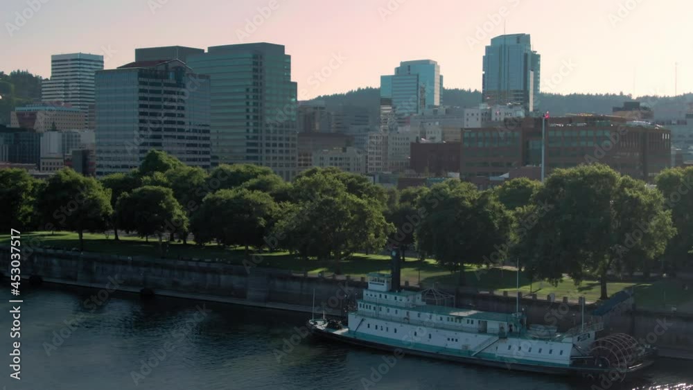 Aerial: Boat on the Willamette River and Portland city skyline. Oregon, USA Aerial: Boat on the Willamette River and Portland city skyline. Oregon, USA
