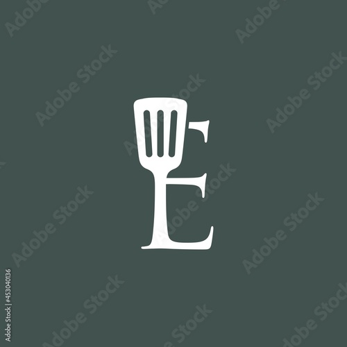 e letter spatula kitchen restaurant chef logo vector icon illustration