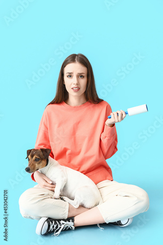 Upset young woman with lint...