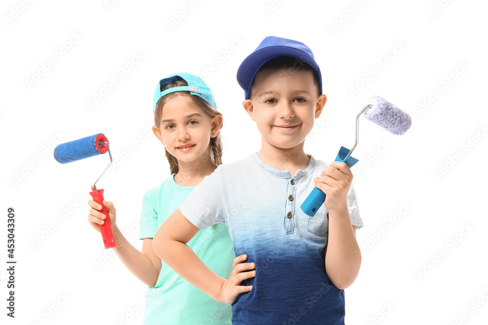 Little children with paint rollers on white background Little children with paint rollers on white background
