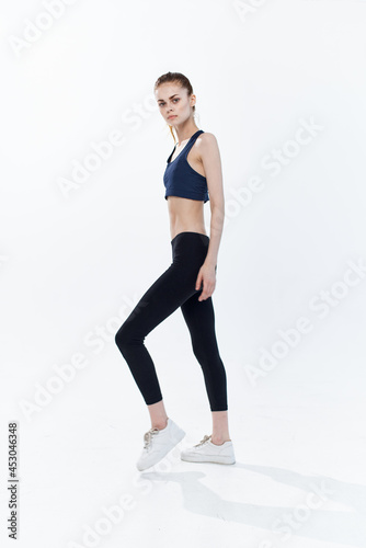sportive woman on workout fitness energy motivation light background