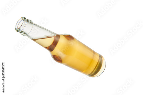 Beer bottles without labels and without caps isolated on white background. Front angle of inclination