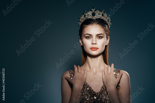 pretty woman with crown on her head bright makeup luxury decoration