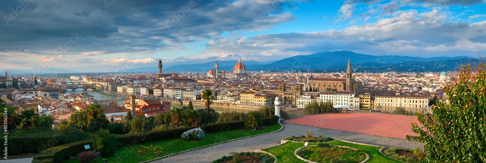 Beautiful Panorama Cityscape of Florence as seen from Piazzale Michelangelo with Old Bridge, Palace of the Town Hall, Cathedral and Basilica of the Holy Cross. Italy