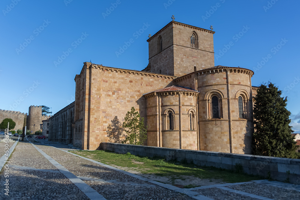 Full view of San Vicente Cathedral, Basílica de San Vicente, Ávila medieval historic fortress as background