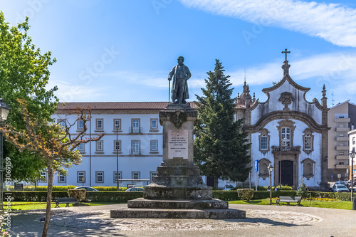 View at the St. Cristina Garden with the Alves Martins bishop statue, Church of the Major Seminary of Viseu, Seminário Maior de Viseu, Convento dos Néris as background photo