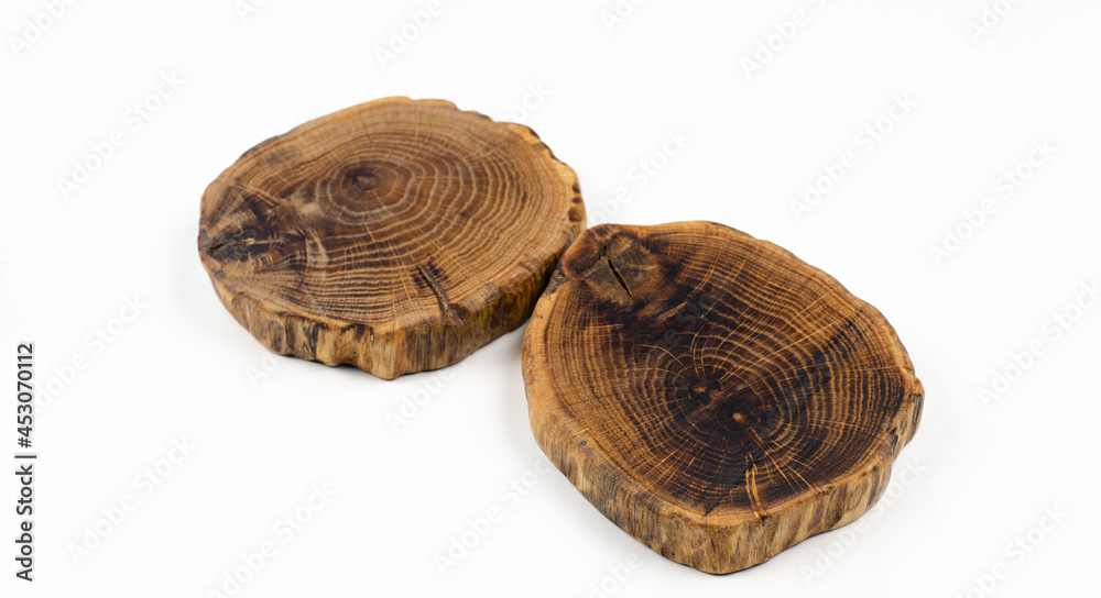 Wooden section saw cut cut. On white background. Wood texture. Wooden section saw cut cut. On white background. Wood texture.