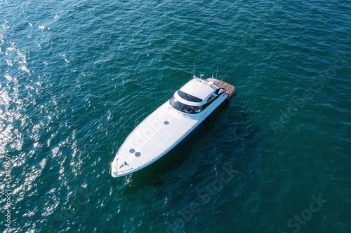 Luxury yacht among the sea. View from above. Shooting from a drone.  © alzay