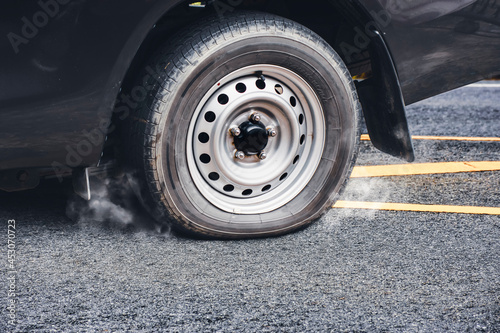 Pickup truck flat tire on the asphalt road