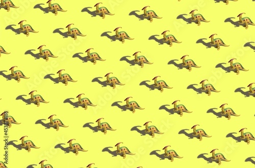 Background for the design and banner. Parasaurolophus, a dinosaur with a shadow on a yellow background. Pattern