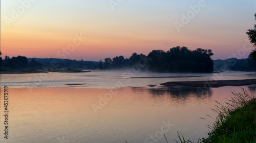 Sunrise on the Loire river bank in the Gaston island. Chatillon-sur-Loire village