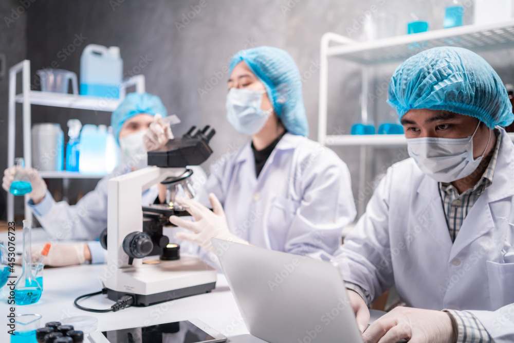 Health care researchers working in life science laboratory, medical science technology research work for test a vaccine, coronavirus covid-19 vaccine protection cure treatment