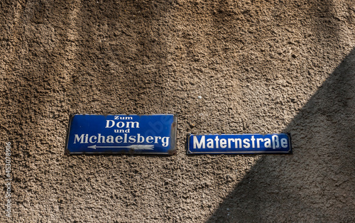 Street signs on the heritage city of Bamberg, Bavaria, Germany.  Directions to Cathedral and Michaelsberg  Abbey and street name Matern Street