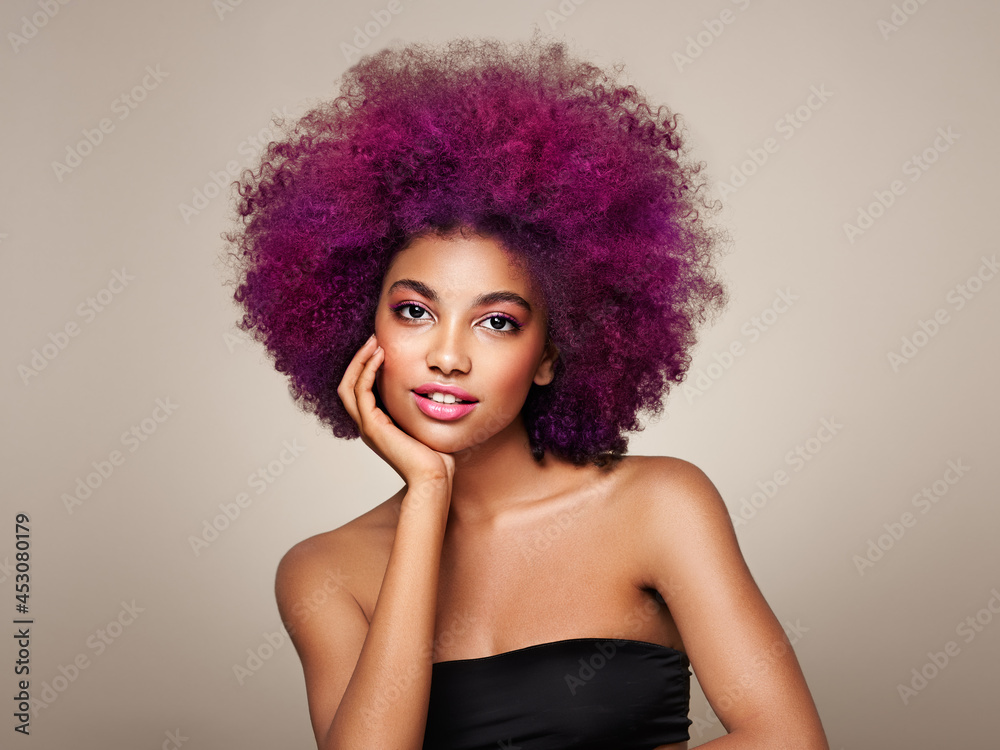 Beauty portrait of African American girl with colorful dyed afro hair. Beautiful black woman. Cosmetics, makeup and fashion - obrazy, fototapety, plakaty 