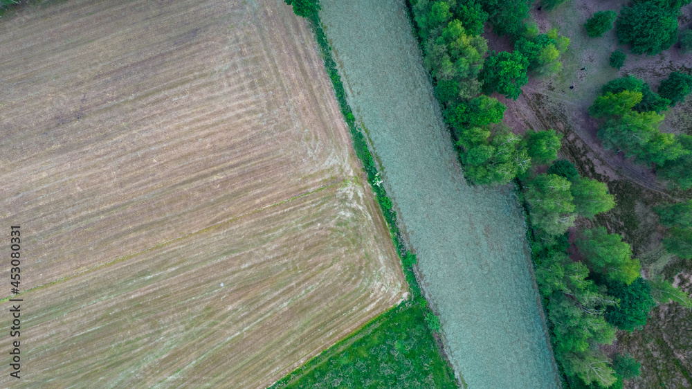 Beautiful natural Patterns of Farmfields in Countryside at Summer. Drone Aerial View, birds eye view. High quality photo Beautiful natural Patterns of Farmfields in Countryside at Summer. Drone Aerial View, birds eye view. High quality photo