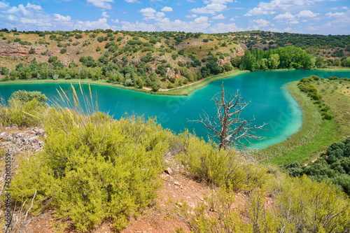 Landscape view from a natural viewpoint on the mountain of the Laguna Conceja Lake in the Lagunas de Ruidera Lakes Natural Park, Albacete province, Castilla la Mancha, Spain 