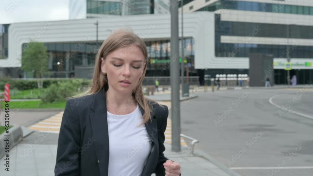 Young Businesswoman Walking on the Street, Slow Motion Young Businesswoman Walking on the Street, Slow Motion