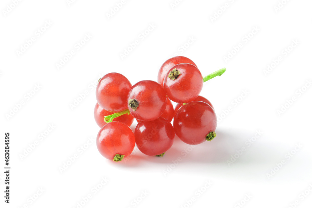 Berries of ripe tasty red currant isolated on white background. red currant with a leaf. a slide of red currants. Red currant berries with leaf isolated on white background. Berries of ripe tasty red currant isolated on white background. red currant with a leaf. a slide of red currants. Red currant berries with leaf isolated on white background.