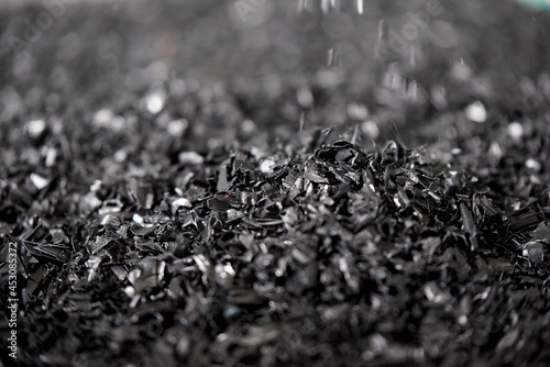 Lots of shredded plastic raw materials for re-production from this plastic products