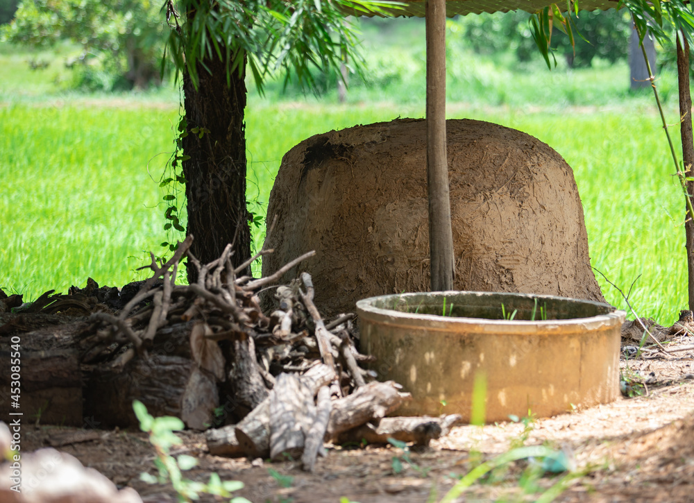 Foto de The charcoal kiln is surrounded by firewood and logs that will