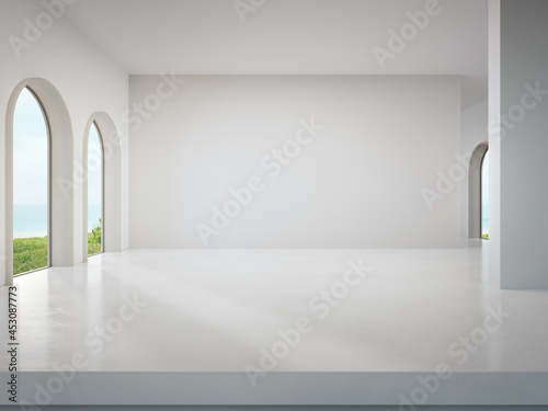 Empty wall on white concrete floor of bright living room in modern beach house or luxury hotel. Minimal home interior 3d rendering with sea view.