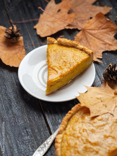 Traditional pumpkin pie for Thanksgiving, autumn dessert, homemade cakes