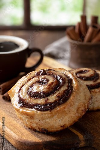 Cinnamon roll and hot coffee