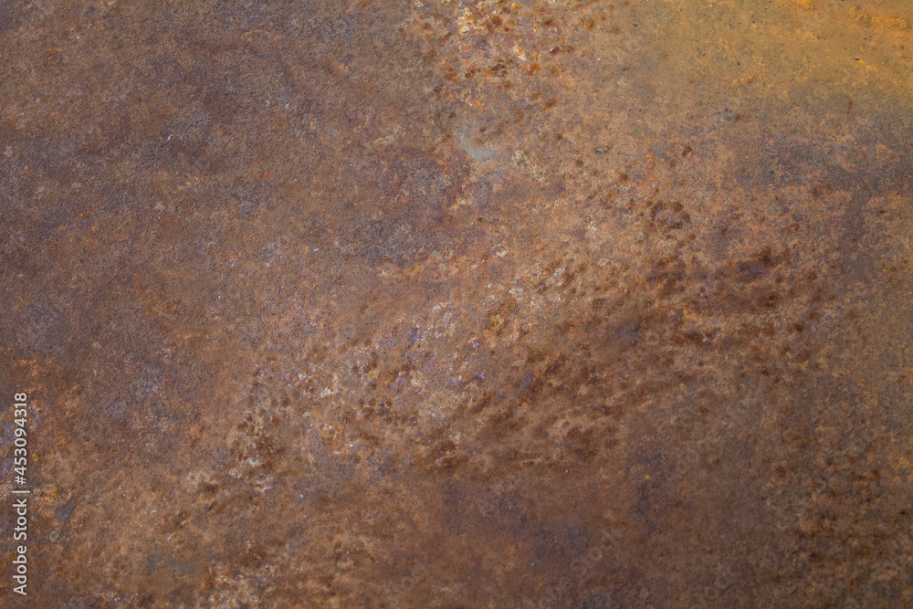 Rusty metal surface with paint residue as background image