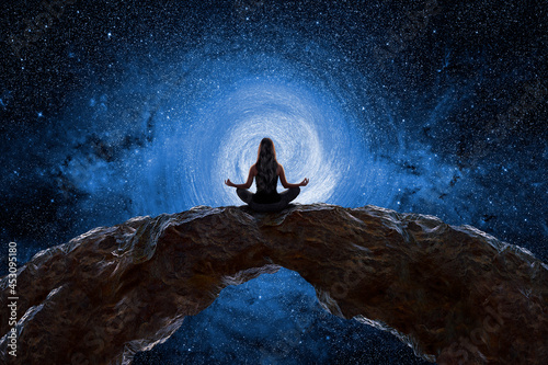 Vászonkép Woman meditating and observing the universe