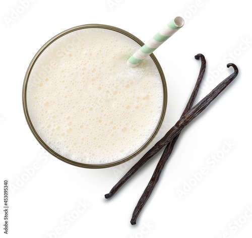 Glass of fresh vanilla milkshake isolated on white background photo