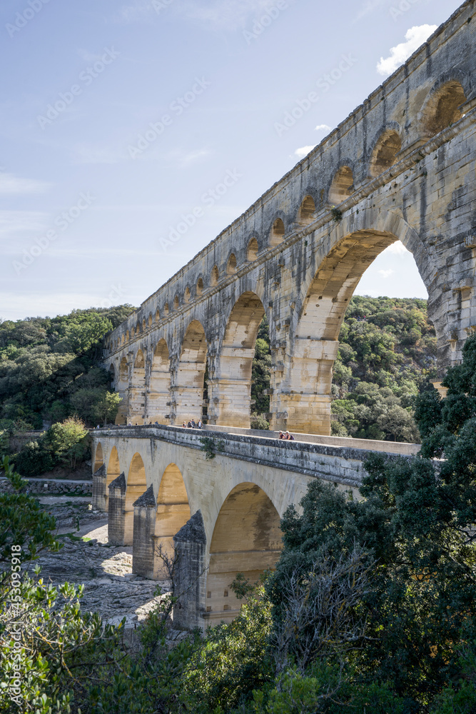 Pont du Gard roman bridge aqueduct on a summer day, Provence, France