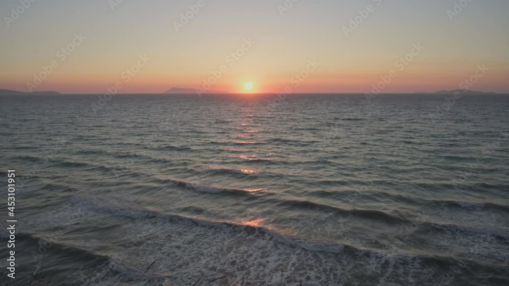 Sea waves in rays of sunset. Windy weather. Sea waves in rays of sunset. Windy weather.