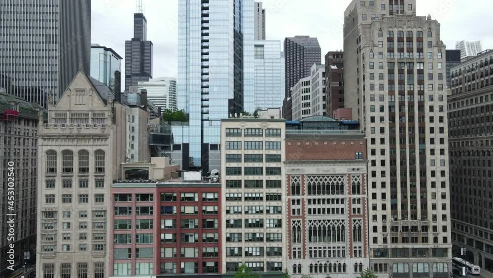 Downtown Chicago USA. Drone Aerial View of Old and New Central Buildings, Avenue Traffic on Cloudy Day, Slide Parallel Shot Downtown Chicago USA. Drone Aerial View of Old and New Central Buildings, Avenue Traffic on Cloudy Day, Slide Parallel Shot