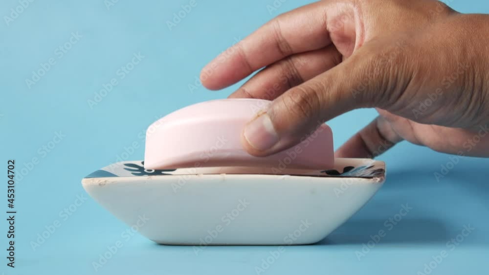 hand pick a soap close up , hand pick a soap close up ,