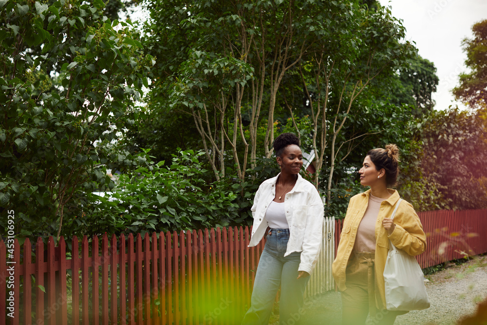 Female friends walking together Female friends walking together