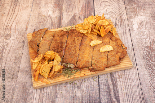 Quadro su tela Beef cachopo with ham and cheese battered with flour, egg and breadcrumbs and a