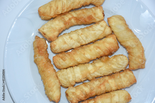 fried brioche served on white plate