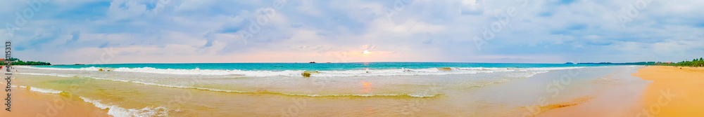 Beautiful colorful sunset landscape panorama from Bentota Beach Sri Lanka.